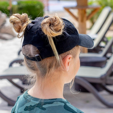 Load image into Gallery viewer, Hand-tailored black youth baseball cap with scrunchies for space buns and pigtails hairstyles 